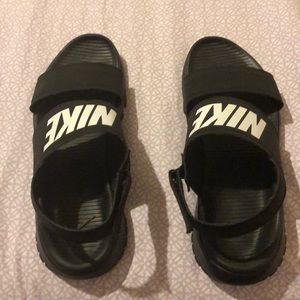 “Nike Sandals with white logo”